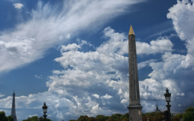 Clouds floating behind the Luxor Obelisk / Cityscapes  photography by Photographer David Henry | STRKNG