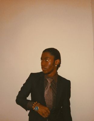 Black man on suit / Fashion / Beauty  photography by Model Nahna James | STRKNG