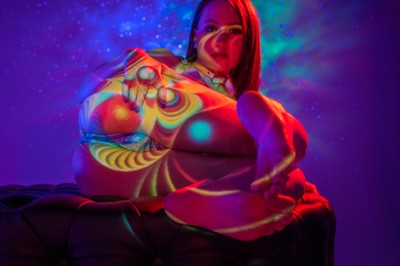 Heavenly Body / Abstrakt / feet,butt,leotard,onesie,psychedelic,colorful,ass,face,beauty,brunette,sexy,sole,toes,cosmic,video projection,bodyscape