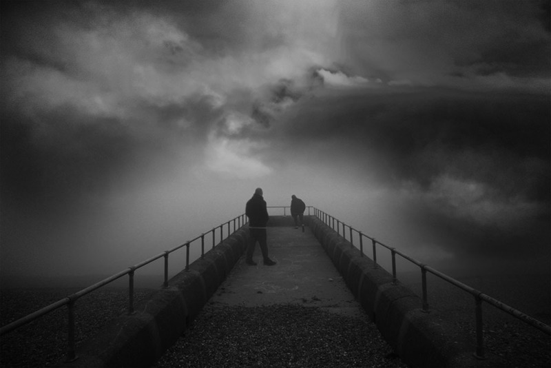 Men on a Groyne - &copy; Nigel Maudsley | Creative edit