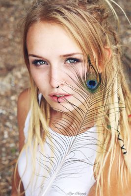feather / Portrait  photography by Model Mad Mel ★8 | STRKNG