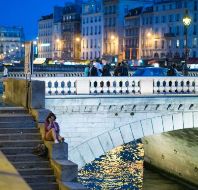 Phone Call by the Seine / Street  photography by Photographer Jan Martin Mikkelsen | STRKNG