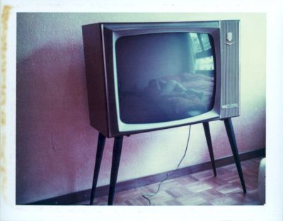 On TV / Instant Film  photography by Photographer Lili Cranberrie ★18 | STRKNG