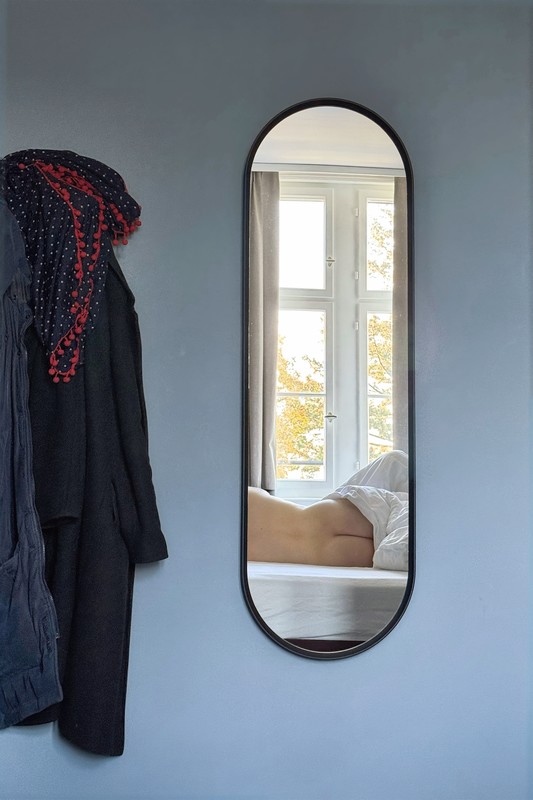 Coat rack with mirror in hotel room - &copy; Bedaman | Nude