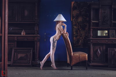 floor lamp / Nude  photography by Photographer LR-Production.de ★2 | STRKNG