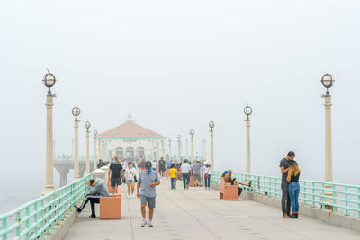 Manhattan Beach Pier / People  photography by Photographer Bill Anastas | STRKNG